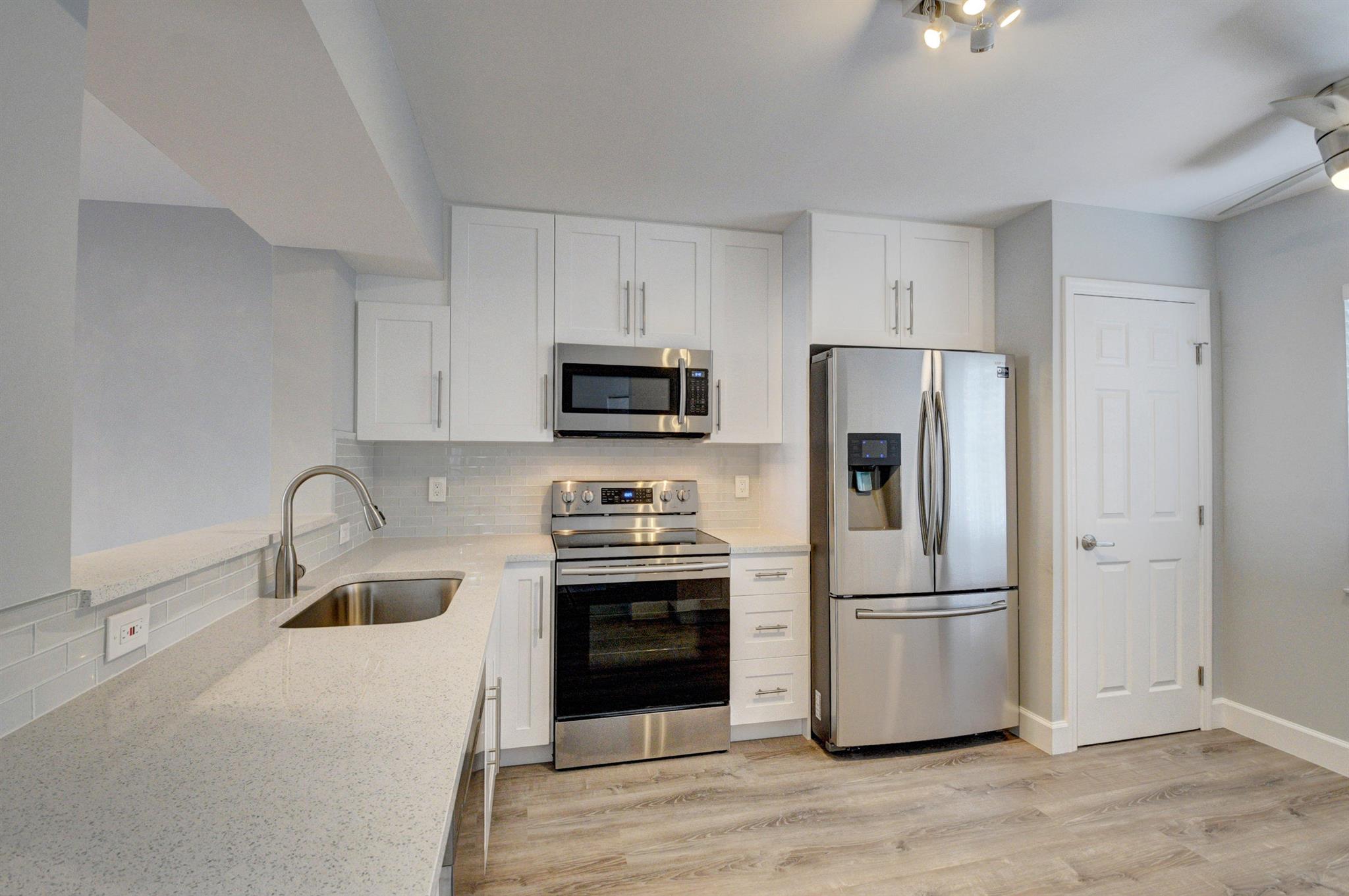 Live the Good Life in this beautifully renovated 2BR/2BA condo in a desirable 55+ gated community just minutes from Downtown Delray and the beach. Enjoy a bright, spacious primary suite with walk-in closet, an open kitchen with abundant storage, full-size washer/dryer, newer appliances, and an enclosed Florida room for extra living space year-round. The community features a newer clubhouse with resort-style pool, hot tub, gym, billiards, poker and card rooms, community room, and a scenic 5-mile walking path. Perfectly located near dining, shopping, theaters, library, houses of worship, medical facilities, and more--schedule your showing today!