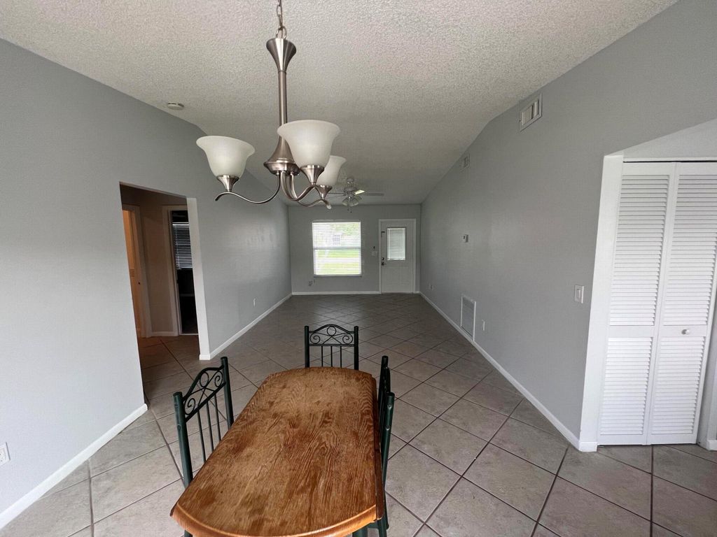 Photo of 5282 W Canal Cir, Lake Worth, FL 33467 (MLS # R11091970)