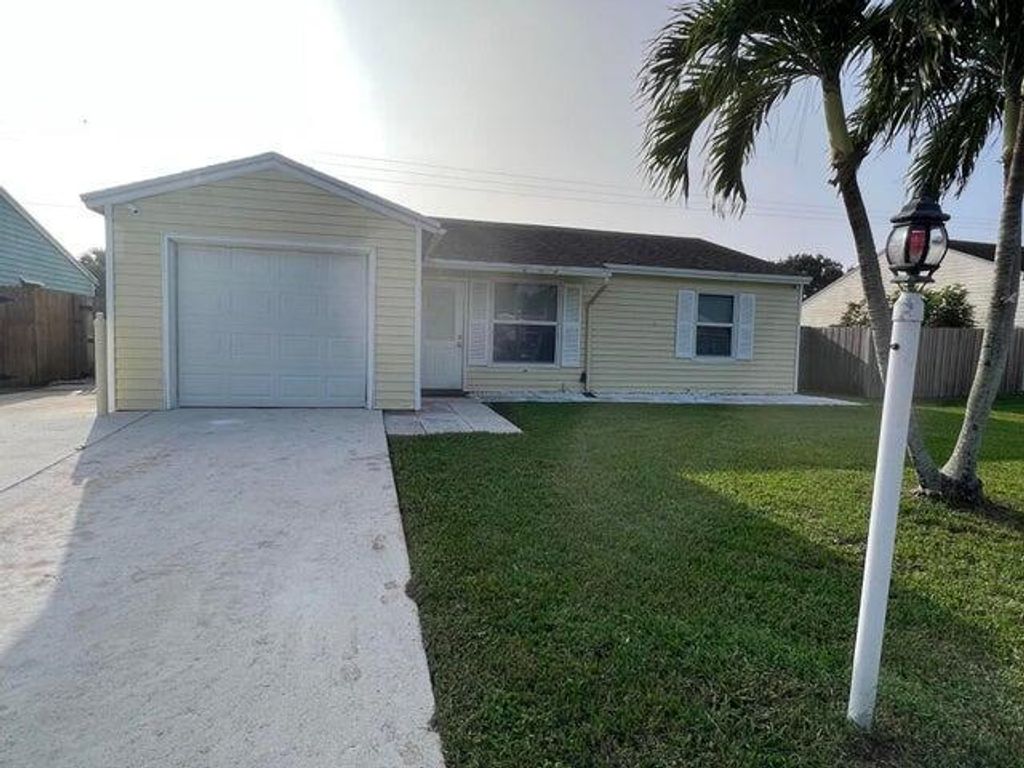 Photo of 5282 W Canal Cir, Lake Worth, FL 33467 (MLS # R11091970)