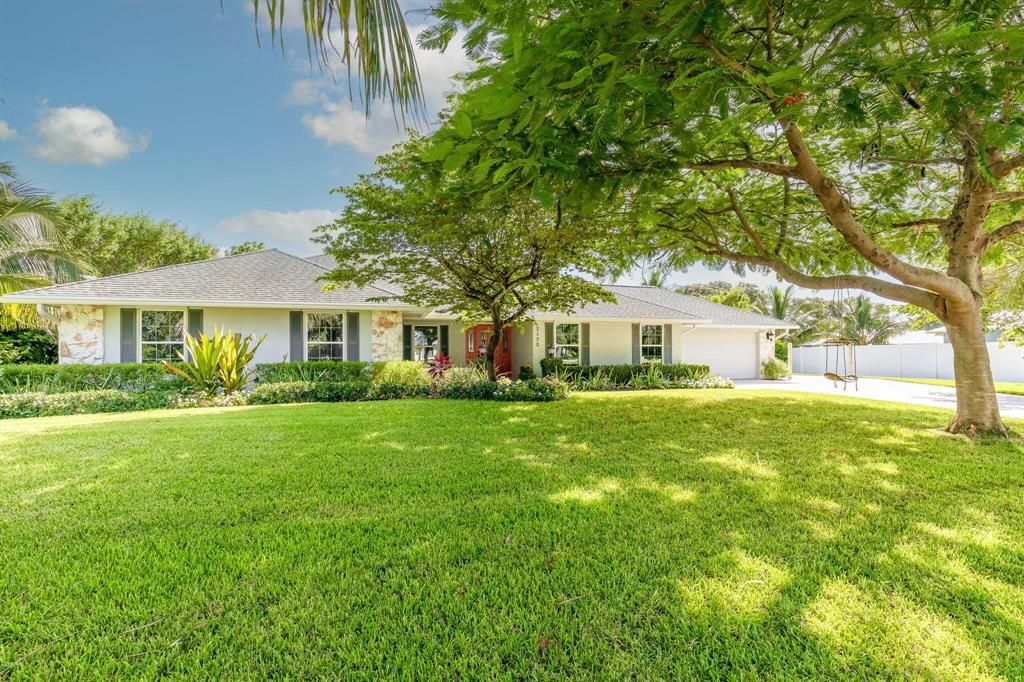 Photo of 2125 NE Ocapi Court Ct, Jensen Beach, FL 34957 (MLS # R10820865)