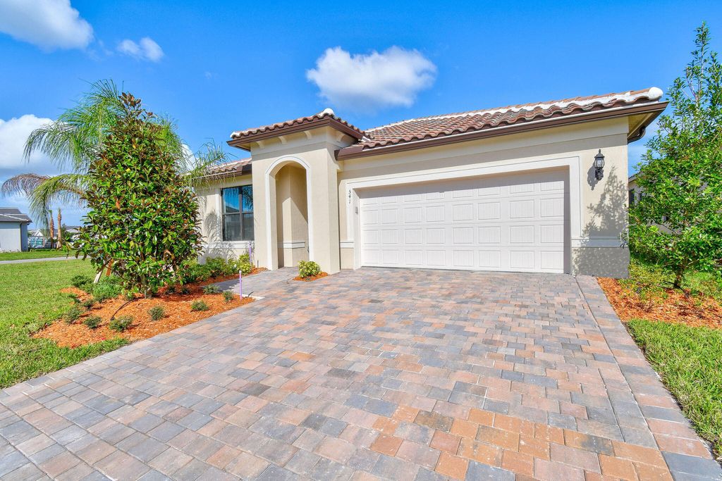 Photo of 541 SE Crathes Way, Port St Lucie, FL 34984 (MLS # R10860507)