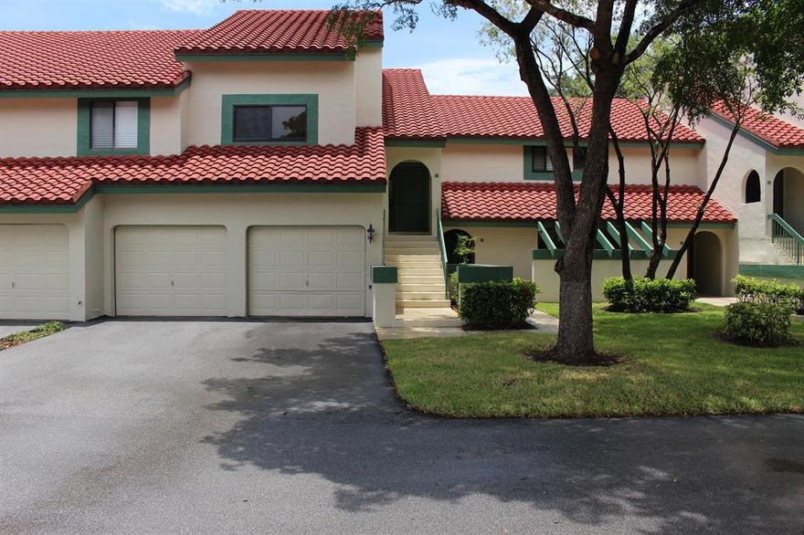 Great opportunity to make this your own. First floor unit, entrance on ground floor no stairs, with attached one car garage. Large screened in patio. Beautiful PGA National neighborhood and community pool.  Conveniently located near both expressways and the PGA corridor for shopping and dining.