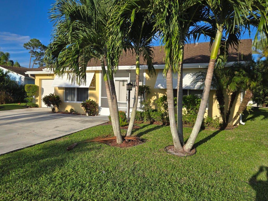 Photo of 7099 PINE MANOR Drive, Lake Worth, FL 33467 (MLS # B26084646)