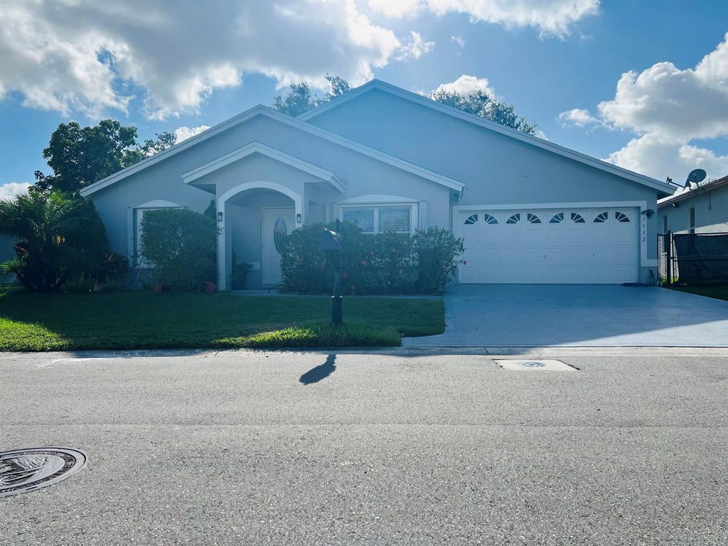 Photo of 1132 Hatteras Circle, Greenacres, FL 33413 (MLS # R10998270)
