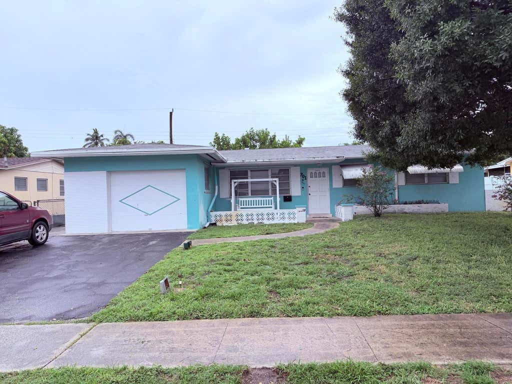 Photo of 701 SW 64TH Terrace, Pembroke Pines, FL 33023 (MLS # B26060259)
