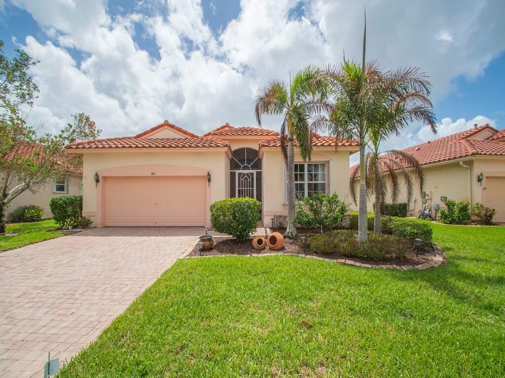 Photo of 383 NW Sunview Way, Port Saint Lucie, FL 34986 (MLS # B26011755)