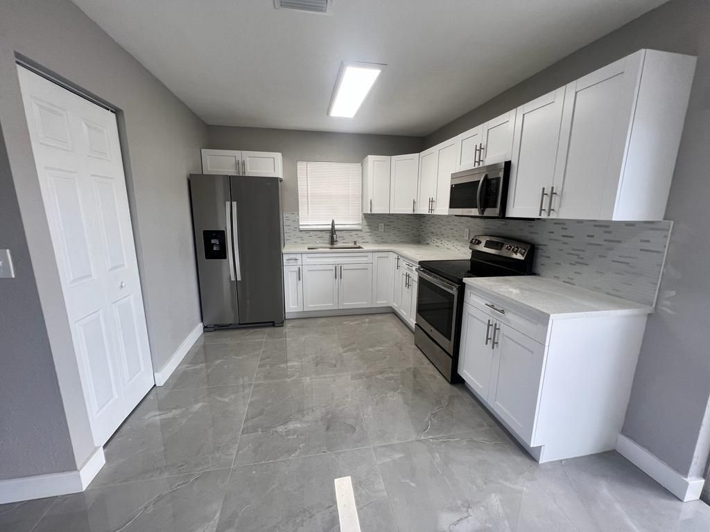 Photo of 151 NE 17th Avenue, Boynton Beach, FL 33435 (MLS # B26027756)