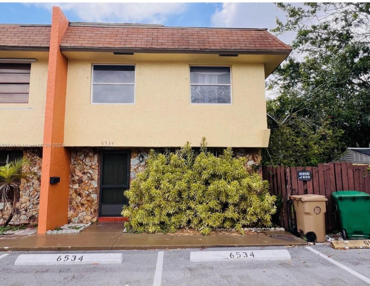 Amazing corner 3/2.5 townhouse with covered porch and large private backyard in the heart of Davie, completely remodeled. Laminate floors, upgraded wood kitchen cabinets, granite countertops, stainless steel appliances, European vanities in bathrooms, washer and dryer in the unit. Two story, living room, guest bathroom, kitchen and patio is ground floor, three bedrooms and two bathrooms are upstairs. Two assigned parking spots at the unit and two guest parking spots, total 4. Great location near Turnpike, I-595, just minutes from Florida Atlantic University, Downtown Davie, Nova Southeastern University, Broward College, and the new super shopping center, Tower Shops. Whole Foods, Costco, Trader Joes, Home Depot, tons of retail stores and restaurants all within minutes.
