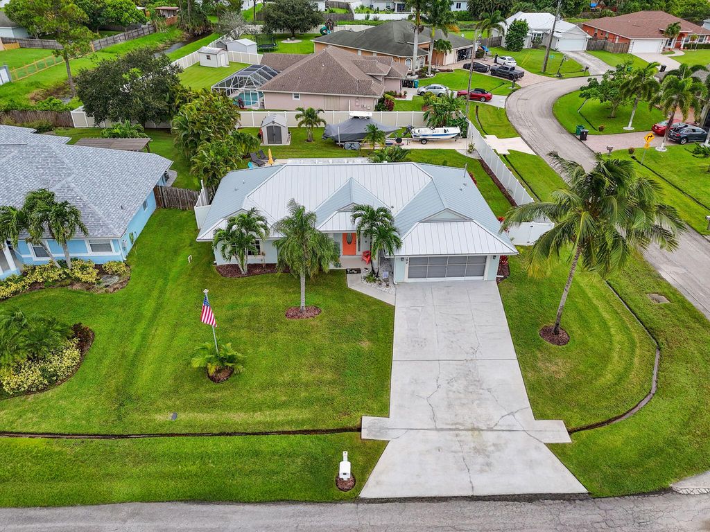 Photo of 3797 SW Carmody Street, Port Saint Lucie, FL 34953 (MLS # R11130934)