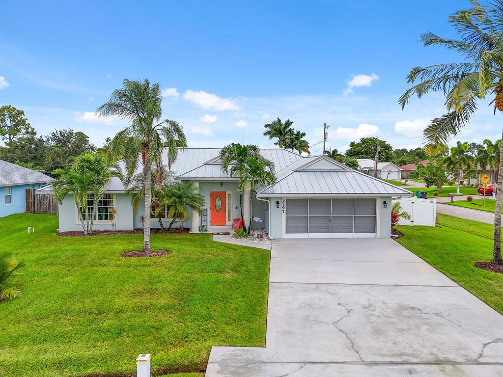Photo of 3797 SW Carmody Street, Port Saint Lucie, FL 34953 (MLS # R11130934)