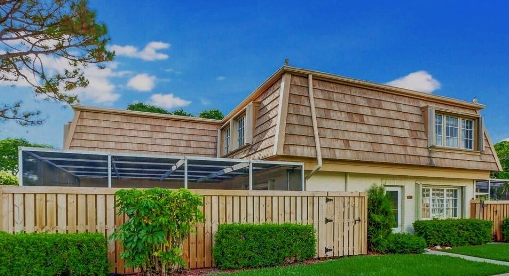 Photo of 11707 Ficus Street #D, Palm Beach Gardens, FL 33410 (MLS # R10961898)