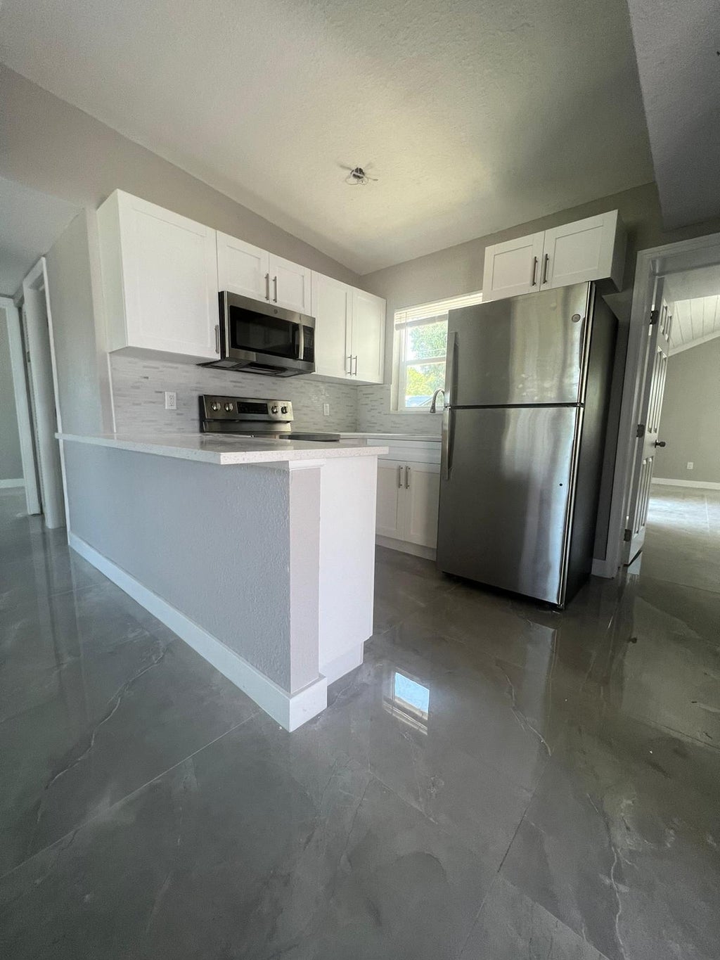 Photo of 550 Seagrape Road, Lake Worth, FL 33462 (MLS # R11097895)