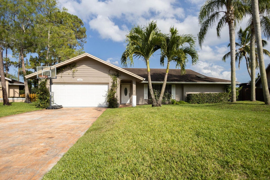 Photo of 13454 Columbine Avenue, Wellington, FL 33414 (MLS # B26081997)