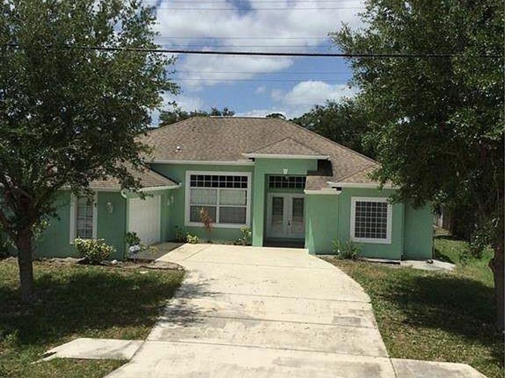 Photo of 2516 SW Edgarce St, Port Saint Lucie, FL 34953 (MLS # F10255529)