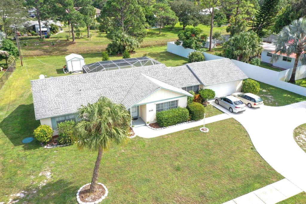 Photo of 2141 SE Morningside Boulevard, Port Saint Lucie, FL 34952 (MLS # R10999571)