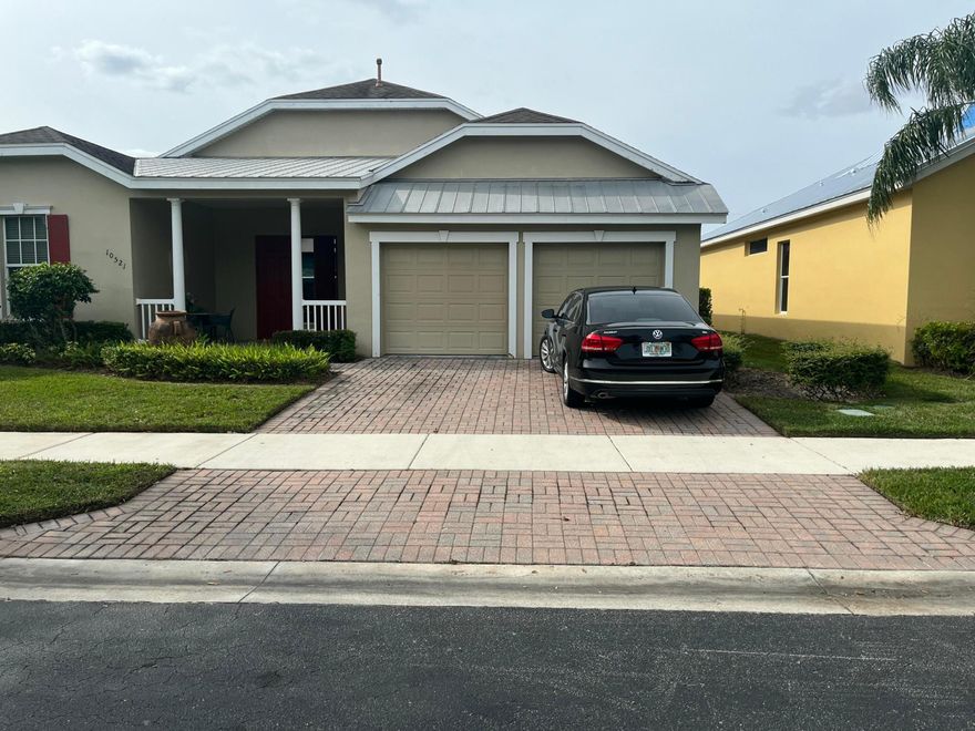 Very large single family home with a private bedroom and bathroom with their own entrance. Main ome has 3 full bedrooms and 2 full bathrooms, lots of living space.  2 front double doors open into a screened pool and patio area before entering the main home.  Very large backyard fully fenced with PVC.  Hurricane shutters included.  2 car garage.  Must see!!! Very low HOA includes cable and internet as well as upkeep of the lawn.