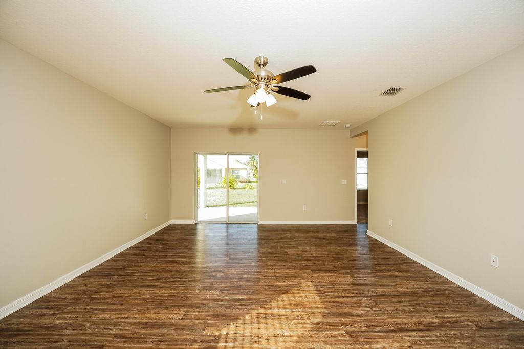 Photo of 4334 SW Appleseed Road, Port Saint Lucie, FL 34953 (MLS # B26016330)