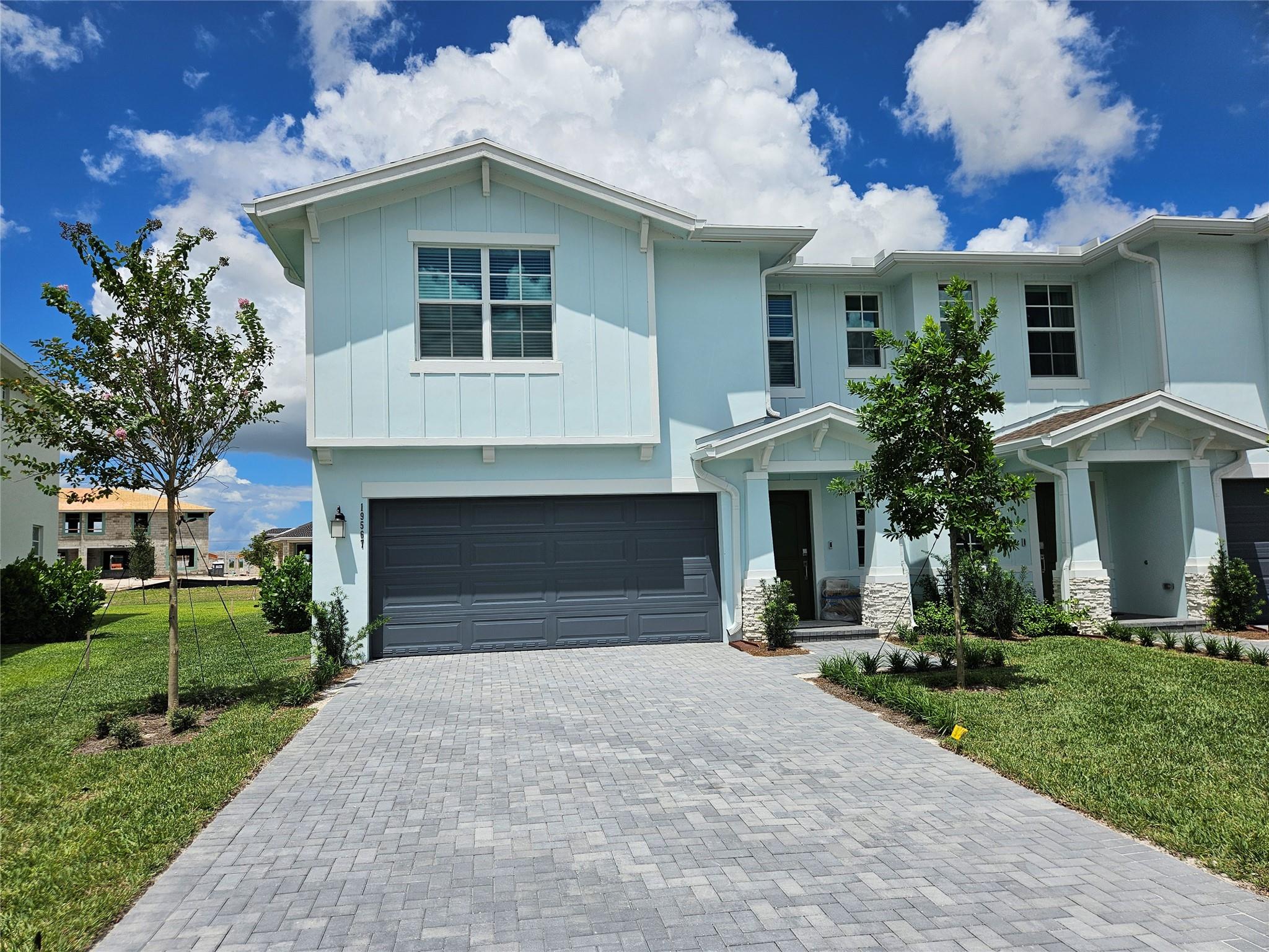 New Construction! This stunning two-story twin home offers an open-concept design on the first floor, featuring a spacious Great Room, a fully equipped kitchen with quartz countertops, all-new stainless steel appliances, including a gas range with a griddle and a built-in microwave, and a lovely dining area. A covered lanai at the rear provides the perfect space for outdoor activities. Upstairs, a cozy loft is surrounded by 2 secondary bedrooms, one junior suite and owner's suite with custon Closets. Two-car garage with epoxy floor. Arden amenities include community lake house with wifi cafe bar, screened patio with fireplace, tennis, playground, 20 miles of walking trails , 2 resort style pools and so much more. Arden community is zoned for A+ school. Arden summer programs for kids