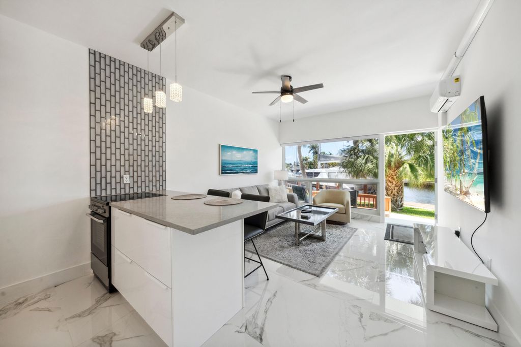 Photo of 810 SE 22nd Avenue #103, Pompano Beach, FL 33062 (MLS # B26024053)