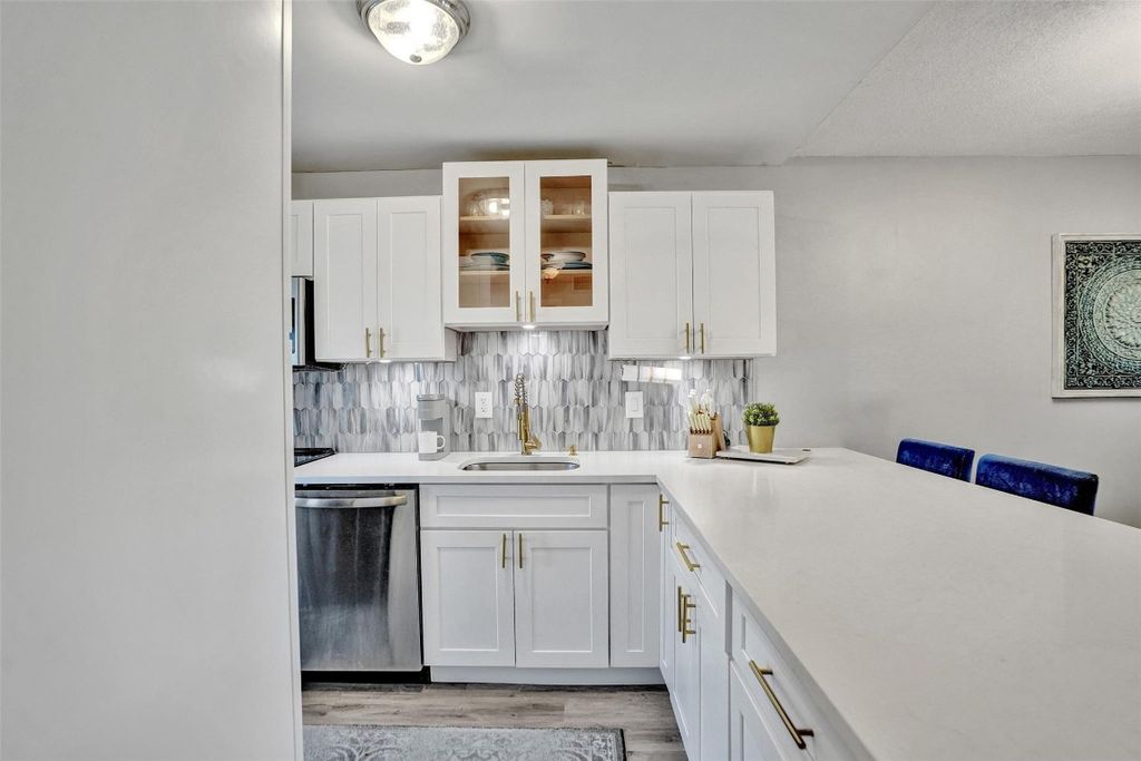 Photo of 400 SE 10th Street #117, Deerfield Beach, FL 33441 (MLS # F10529585)