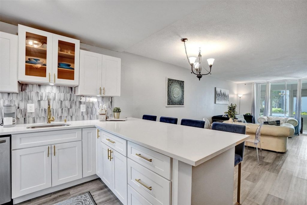 Photo of 400 SE 10th Street #117, Deerfield Beach, FL 33441 (MLS # F10529585)