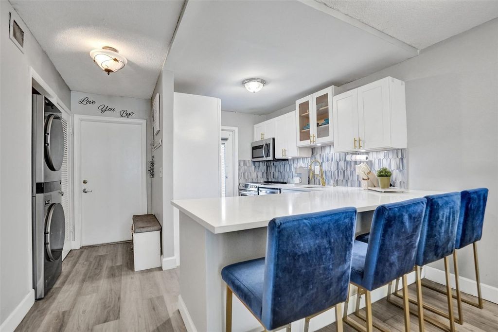 Photo of 400 SE 10th Street #117, Deerfield Beach, FL 33441 (MLS # F10529585)