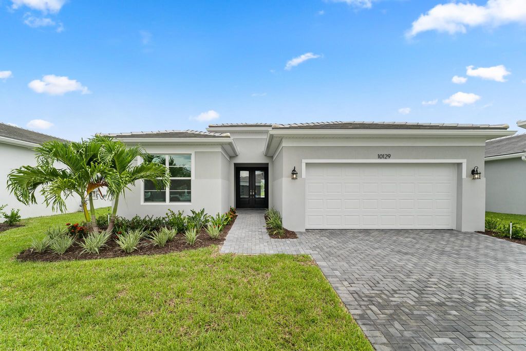 Photo of 10129 SW Carnelian Street, Port Saint Lucie, FL 34987 (MLS # R11109637)