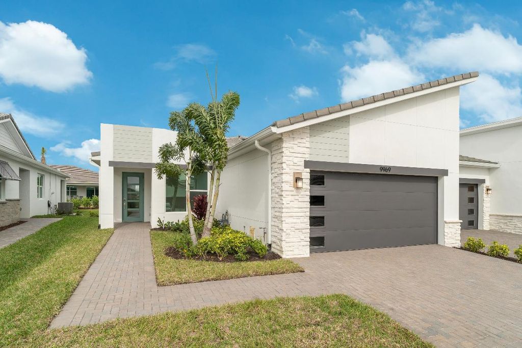 Photo of 9969 SW Isabelline Drive, Port Saint Lucie, FL 34987 (MLS # R10968742)