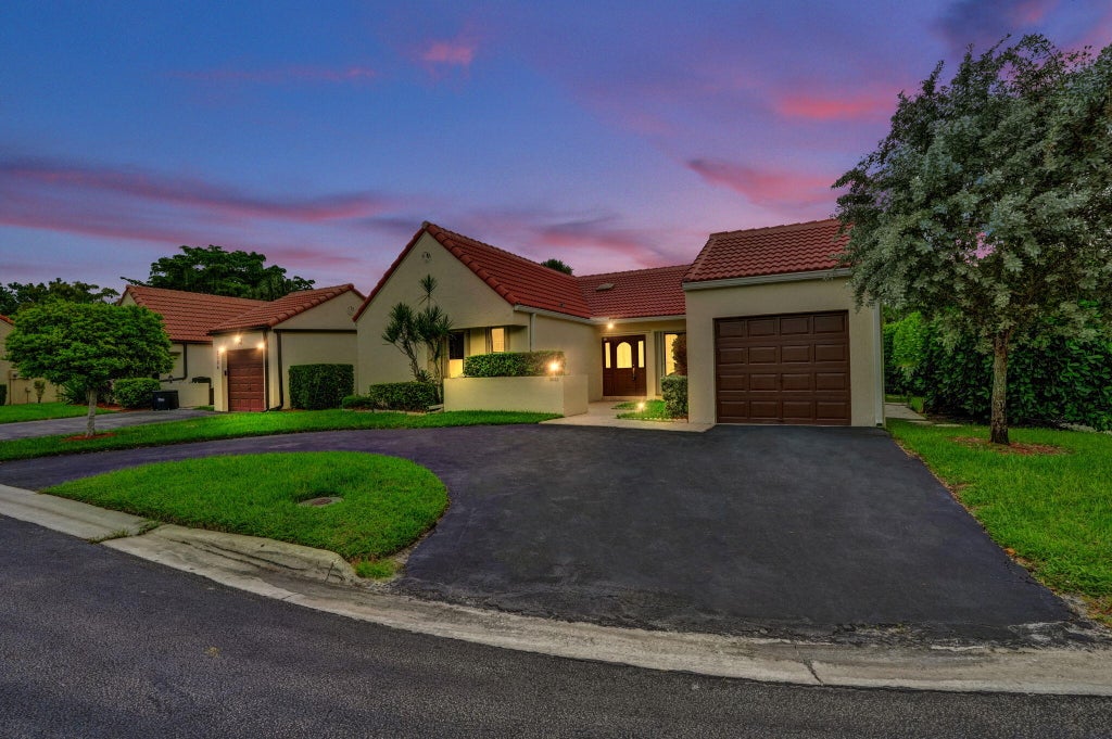Photo of 2001 Maplewood Drive, Coral Springs, FL 33071 (MLS # B26083890)