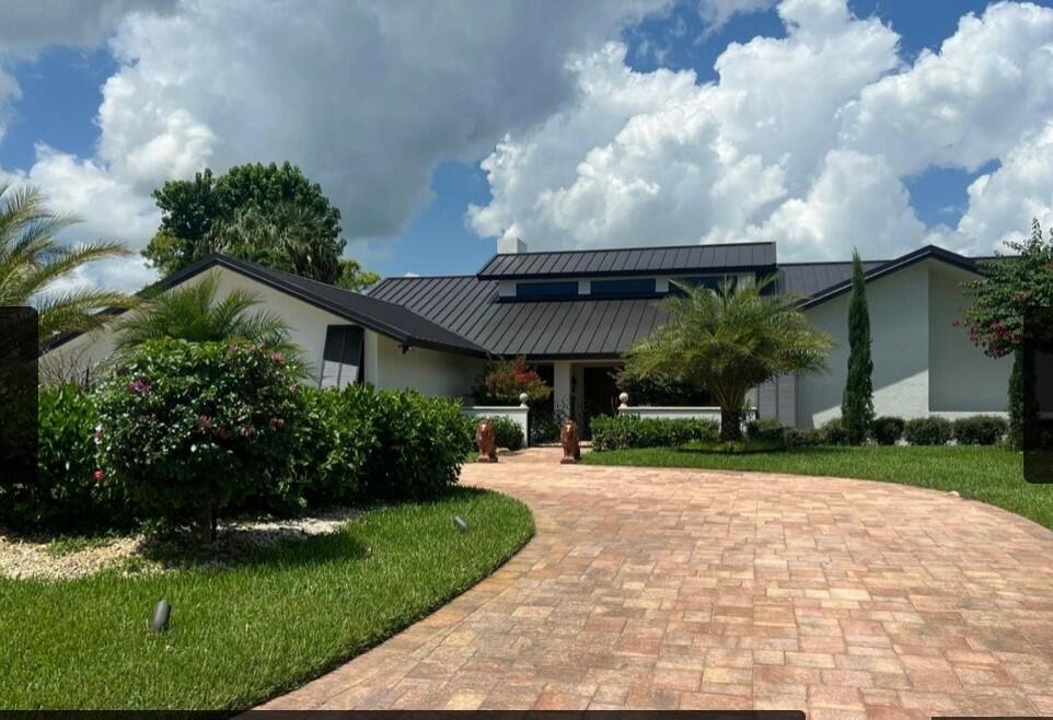 Photo of 5091 SE BURNING TREE Circle, Stuart, FL 34997 (MLS # B26059080)