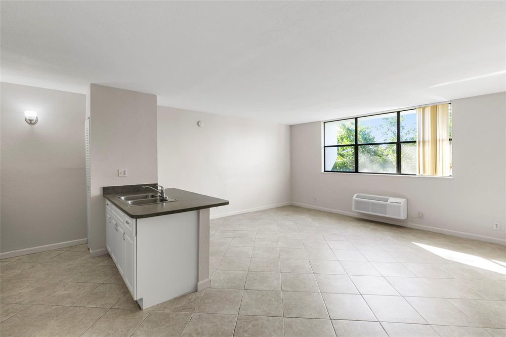 Photo of 2401 Riverside Dr #518B, Coral Springs, FL 33065 (MLS # F10532569)