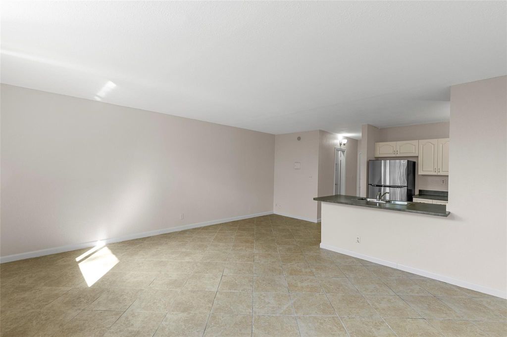 Photo of 2401 Riverside Dr #518B, Coral Springs, FL 33065 (MLS # F10532569)