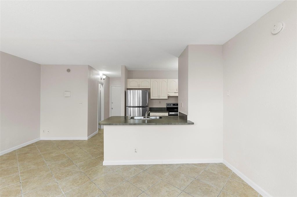 Photo of 2401 Riverside Dr #518B, Coral Springs, FL 33065 (MLS # F10532569)