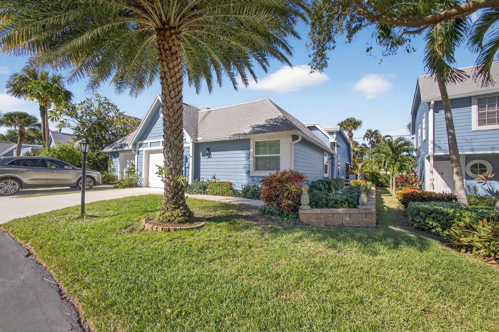 Photo of 1405 Ocean Dunes Circle, Jupiter, FL 33477 (MLS # R11143286)