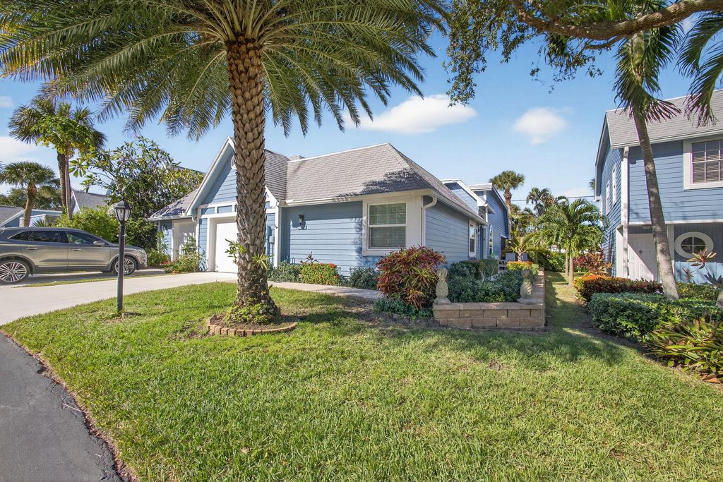 Photo of 1405 Ocean Dunes Circle, Jupiter, FL 33477 (MLS # R11143286)
