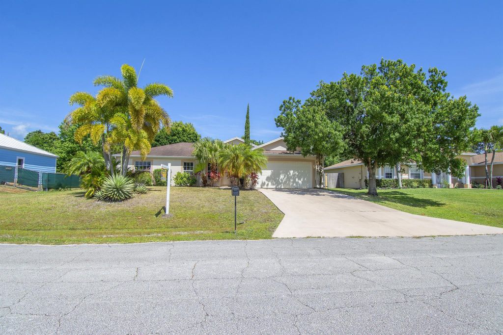 Photo of 2373 SE Marius Street SE, Port Saint Lucie, FL 34952 (MLS # R10983507)