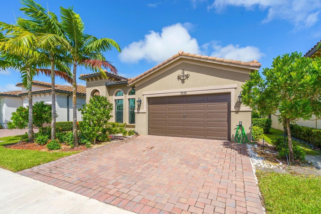 Photo of 7535 Seacoast Dr, Parkland, FL 33067 (MLS # F10496448)
