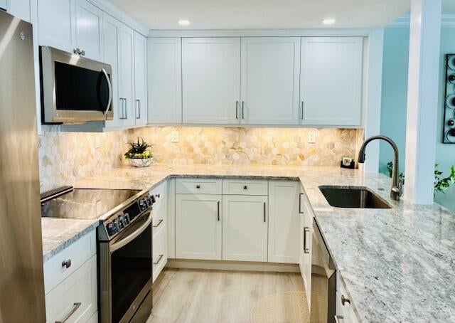 Photo of 3009 S Ocean Boulevard #503, Highland Beach, FL 33487 (MLS # B26012864)