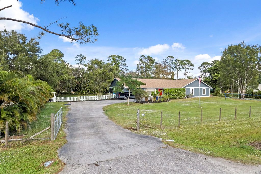Photo of 12895 53rd Road N, The Acreage, FL 33411 (MLS # R11150166)