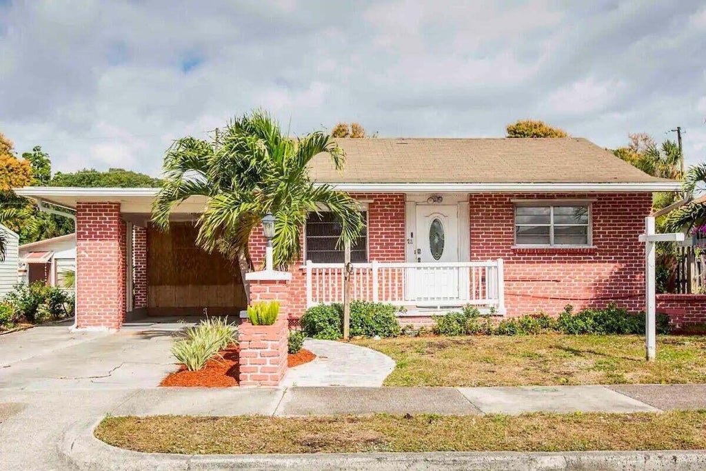 Photo of 711 Tuscaloosa Street #1, West Palm Beach, FL 33405 (MLS # B26080159)