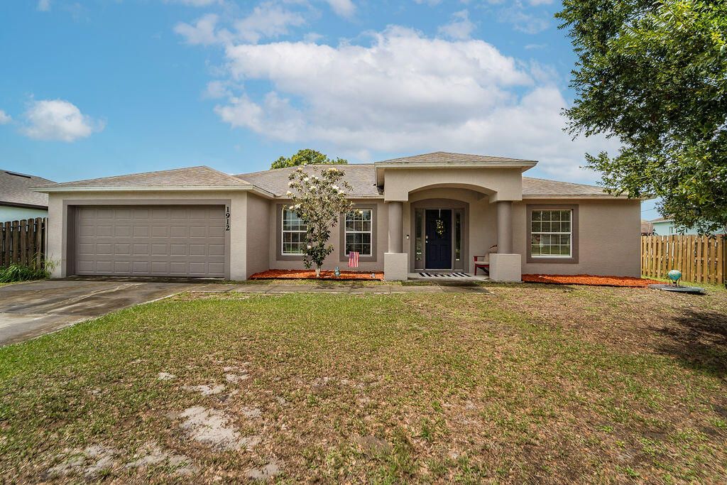 Photo of 1912 SW Sunglow Street, Port Saint Lucie, FL 34953 (MLS # B26018284)