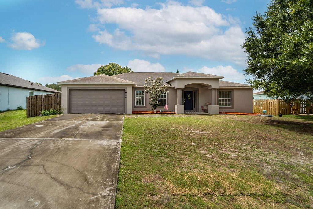 Photo of 1912 SW Sunglow Street, Port Saint Lucie, FL 34953 (MLS # B26018284)