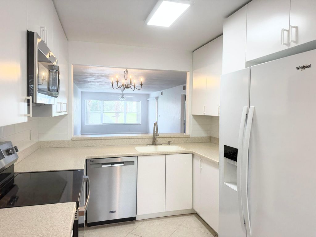 Photo of 4745 Lucerne Lakes Boulevard #102, Lake Worth, FL 33467 (MLS # R11157450)
