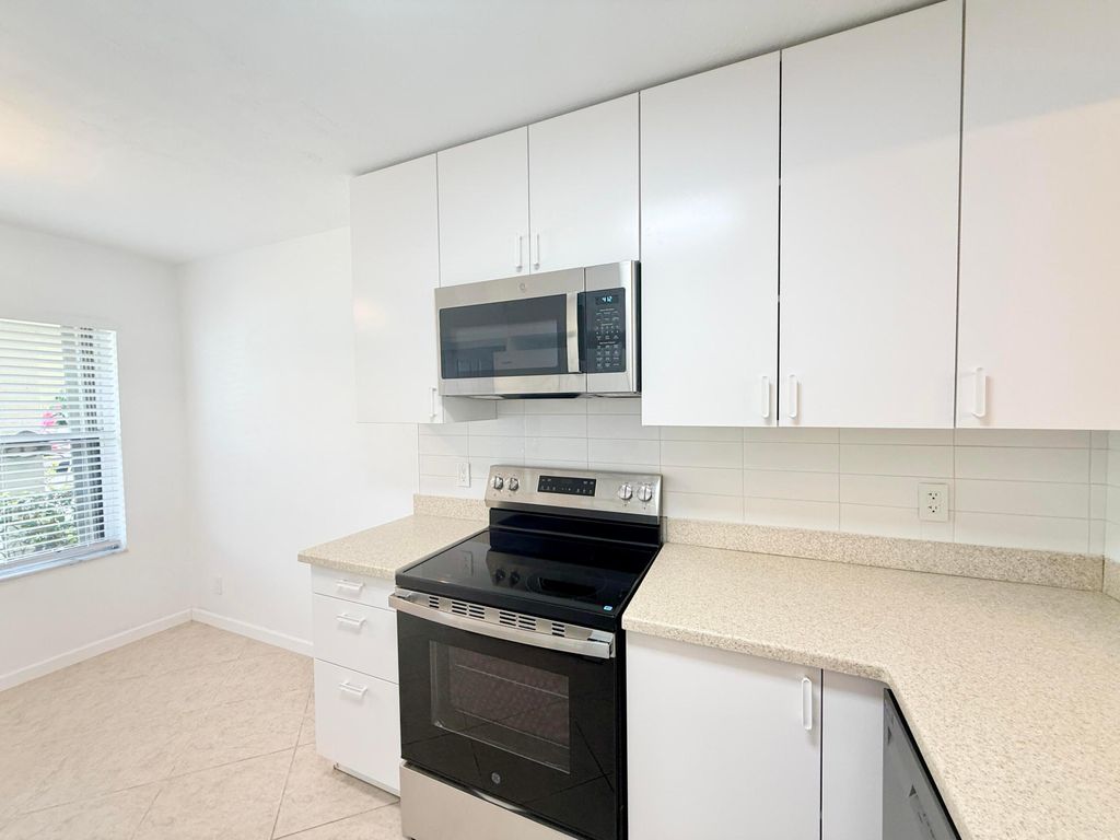 Photo of 4745 Lucerne Lakes Boulevard #102, Lake Worth, FL 33467 (MLS # R11157450)