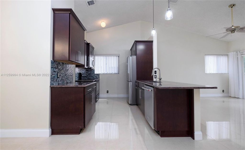 Photo of 18 Via De Casas Sur #203, Boynton Beach, FL 33426 (MLS # R10947431)
