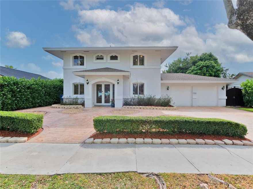 TASTEFULLY REMODELED DREAM POOL HOME!!!With 2,773 SF--4 BEDROOMS 3BATHROOMS and 2 CAR GARAGE, Located in a very DESIRABLE NEIGHBORHOOD. It has NEW ROOF(2018), NEW DOORS AND IMPACT WINDOWS, FANTASTIC NEW KITCHEN WITH STAINLESS APPLIANCES and WET BAR, NEW AC AND WATER HEATER(2018), UPDATED BATHROOMS, NEW TILE FLOOR downstairs and WOODEN FLOORS UPSTAIRS, MAIN BEDROOM WITH VERY SPACIOUS WALKING CLOSET with BUILD-INS and "MUCH MORE".You will absolutely love the "COVERED PATIO" GORGEOUS SWIMMING POOL, NEW AMAZING GAZEBO WITH SUMMER KITCHEN, and the entire OUTDOOR that will make everyone jealous. NEW MODERN FENCE(2021) PALM TREES WITH ORCHIDS AROUND THE POOL. AS an addition The garage was converted and is currently rented for $ 1200 per monthTHIS PROPERTY IS A TRUE PARADISE WAITING FOR YOU!!!