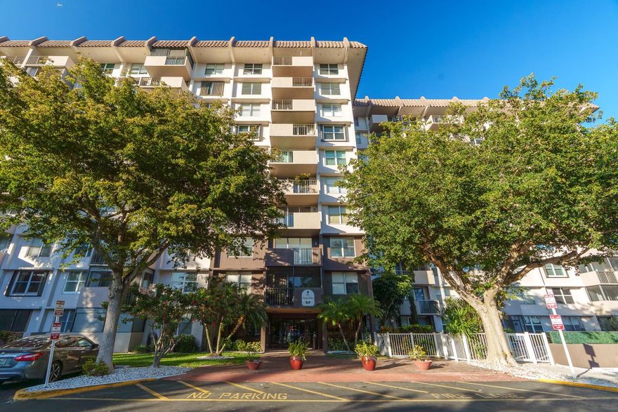 Enjoy amazing views of the sunrise with your cup of coffee or sunsets with a glass of wine from your 8th floor south facing unit! Super clean, bright and airy... the perfect spot to call home or even a secondary seasonal vacation home! Secure lobby and complete hurricane protection... just close up the front door and you are good to go travel!Large walk-in closet, extra storage and laundry right on the floor. Island Club has a main pool area with tiki bar, playground, grills and firepit... open to the whole community! Guard gate manned 24/7. 40 year inspection complete!