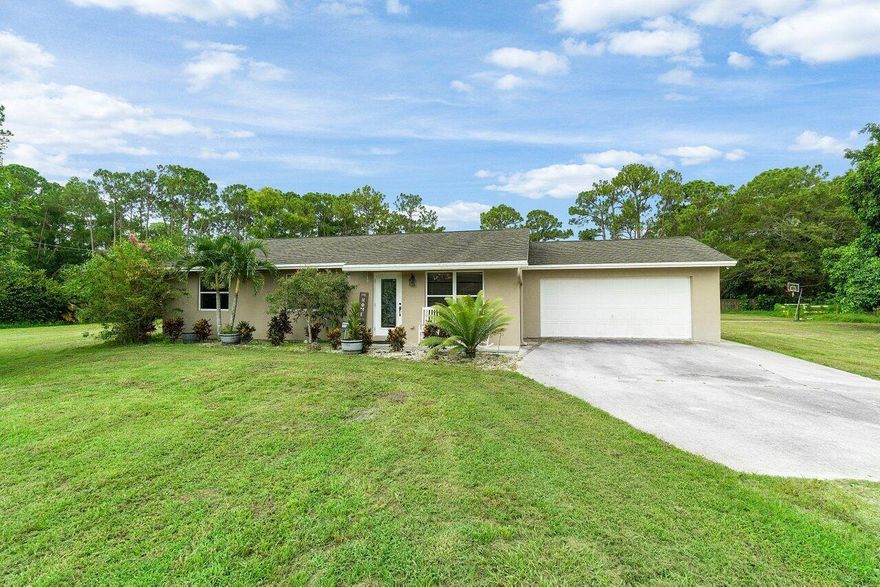 An excellent home with over 1 acre of property! The options are limitless! This amazing house offers 4 bedrooms, 3 bathrooms, a gorgeous pool, tiki hut, basketball area, detached garage/storage shed, a huge lot, and tons of outdoor space. There is an abundance of room on the property for your boats, trailers, RVs, jet skis, guest house, storage, + so much more! RV is hookup is available as well. Peaceful and private location that is conveniently located close to great schools, shopping centers, restaurants, entertainment venues, etc. Enjoy all that South Florida has to offer!