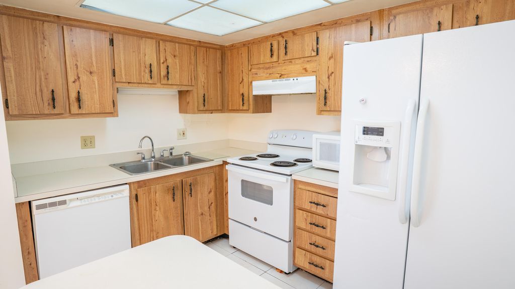 Photo of 4686 Oak Terrace Drive, Greenacres, FL 33463 (MLS # R11079116)