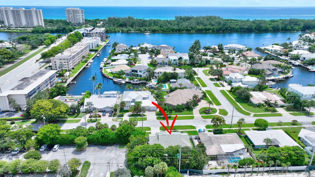 Photo of 3841 NE 6TH Drive, Boca Raton, FL 33431 (MLS # B26078393)